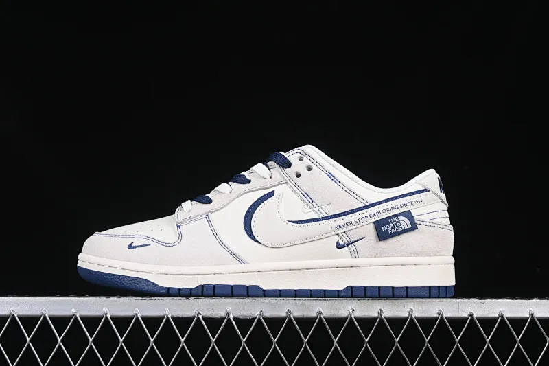 All Categories Nk SB Dunk Series Nk SB Dunk Low High-end Customized Low-top Shoes Nk SB Dunk Low North Face Co-branded Zhuba White Blue Hook Anniversary High-end Customized Low-top Casual Shoes DM6868-023